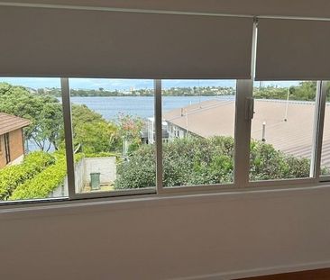 Exceptional Two Bedroom plus Study Townhouse with Stunning Lake Views - Photo 1