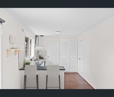 BEAUTIFULLY RENOVATED FAMILY HOME IN A CONVENIENT LOCATION! - Photo 1