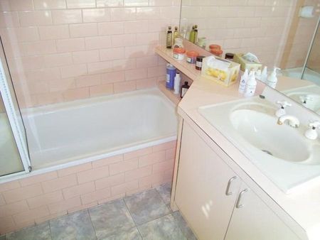 DELIGHTFUL 3 BEDROOM BRICK HOME WITH OFF STREET PARKING FOR 1-2 CARS - Photo 4