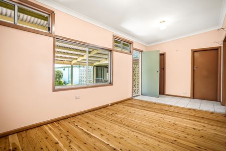 Air-Conditioned Four-Bedroom Family Home with Two Living Areas, Single Carport and Tandem Garage! - Photo 2