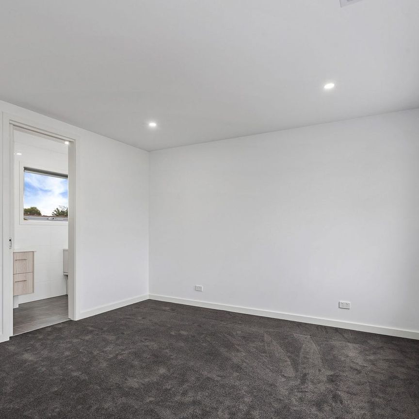 EXCEPTIONALLY DESIGNED TOWNHOUSE! - Photo 1