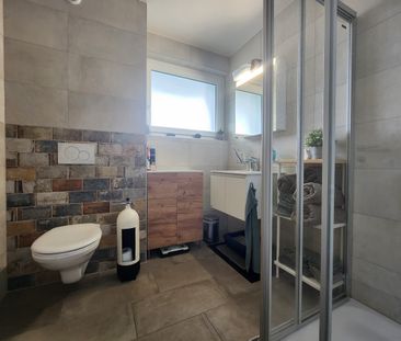 Appartement de 2,5 pièces au rez-de-chaussée avec jardin - Photo 5