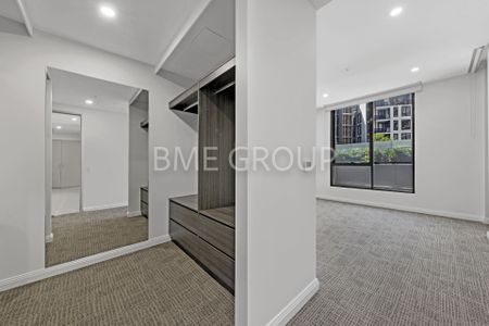 Oversized 2-Bedroom Apartment | Heart of Green Square | Luxury Marble & Resort Living - Photo 4