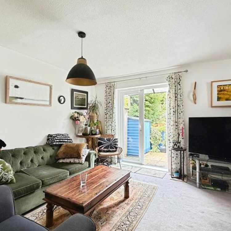 A well-presented two double bedroom end of terrace home with a modern kitchen and bathroom, spacious living/dining room, excellent storage and a lovely colourful garden. - Photo 1