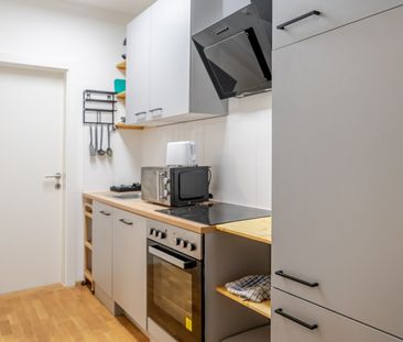 Einziehen & wohlfühlen: Voll möblierte 2-Zimmer-Wohnung mit Balkon,... - Photo 5
