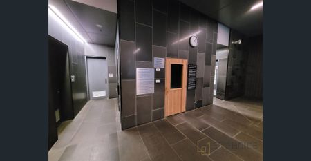 Furnished High-Floor 2BR Apartment with Sunlit Living & Luxury Amenities - Photo 2