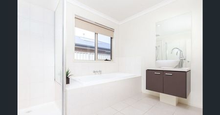 Stylish 3-Bedroom Home with 2 Bathrooms and Double Garage - Photo 5