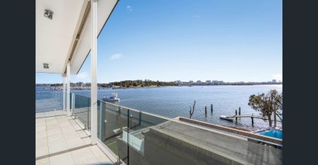 Waterfront Luxury with Panoramic River Views - Photo 5