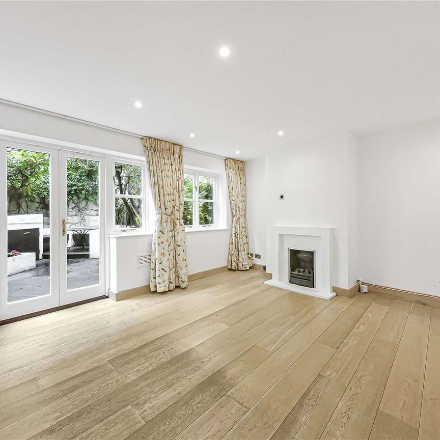 Modern 4 bedroom townhouse in a secure gated development, close to Hampstead Heath ponds, and overground station. - Photo 1
