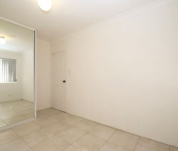 Two Bedroom Ground Floor Unit - Photo 2