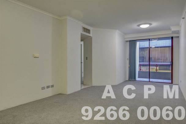 Unfurnished 1-bedroom Apartment on Paramount's 3rd Floor! - Photo 1