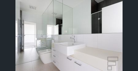 Stylish Top-Floor Apartment in the McKinnon School Zone | FLARE REAL ESTATE - Photo 5