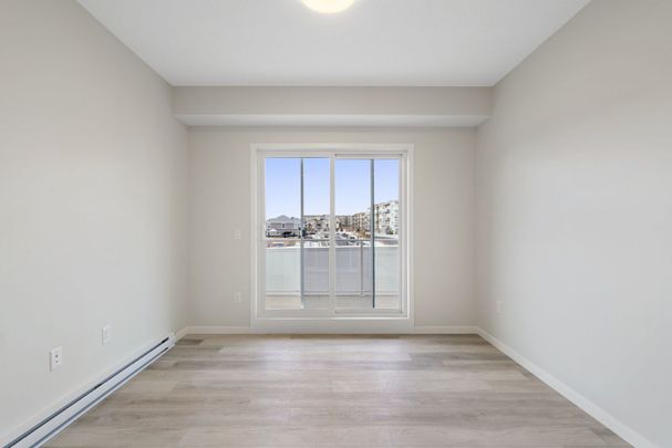 208, 360 Harvest Hills Way NE - 1 - Photo 1