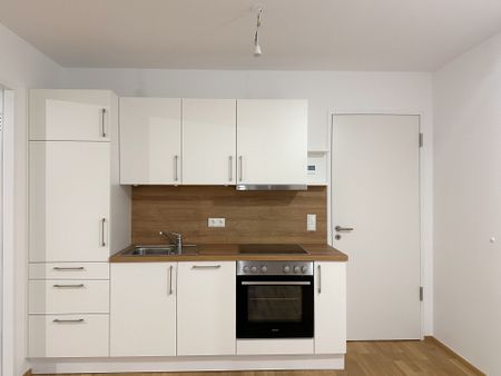 Helle 2 Zimmer Wohnung mit Balkon - ERSTBEZUG - Foto 4