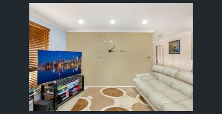 This beautifully presented 4-bedroom home offers the perfect blend of comfort, style, and convenience — ideal for growing families - Photo 2