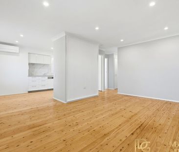 Beautifully Renovated Brick Home Offering Modern Comfort and Easy L... - Photo 2