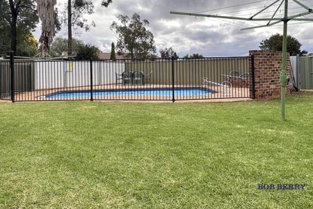 Two-Bedroom Duplex with Pool - Prime Location Near Orana Mall - Photo 4