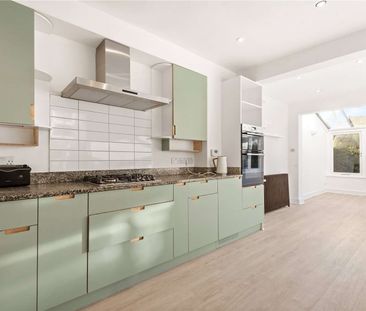 A lovely family home with grand proportions and a wider than averag... - Photo 4