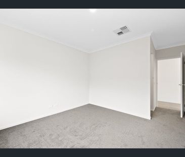 FOUR BEDROOM HOME WITH TWO LIVING AREAS AND DUCTED HEATING AND COOLING - Photo 2