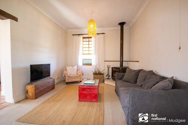 CHARMING CBD LIVING WITH SPACE AND CONVENIENCE - Photo 1