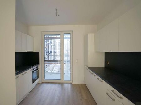 Neubau! Stilvolle 2-Zimmer-Wohnung mit Balkon & Einbauküche im Zentrum-Ost - Photo 3