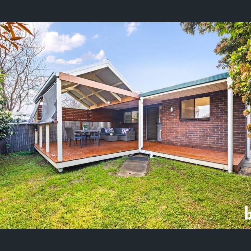 Modern 2-Bedroom Unit with Low-Maintenance Yard - Photo 1