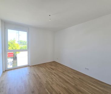 Erstbezug: geförderte 3 Zimmer Wohnung mit Balkon in ruhiger und ze... - Photo 2