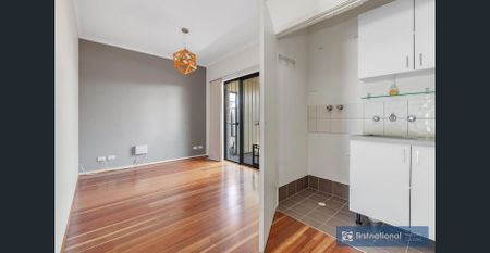 IMMACULATE AND WELL APPOINTED THREE BEDROOM HOME - Photo 3