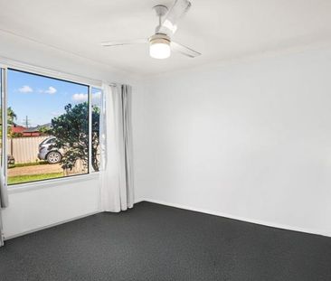 SPACIOUS FAMILY HOME WITH MULTIPLE LIVING AREAS - Photo 1