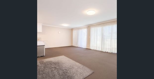 Modern, Low-Maintenance Townhouse in a Convenient Location - Photo 1