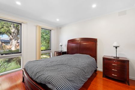 Spacious Four-Bedroom Home with Gardening Included - Photo 2