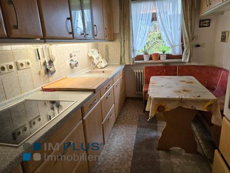 Große 2 Zimmer Garten-Wohnung mit EBK, überdachte Terrasse und 2 Stellplätzen ! - Foto 4