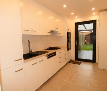 Gelijkvloers appartement met tuin en terras - Photo 1