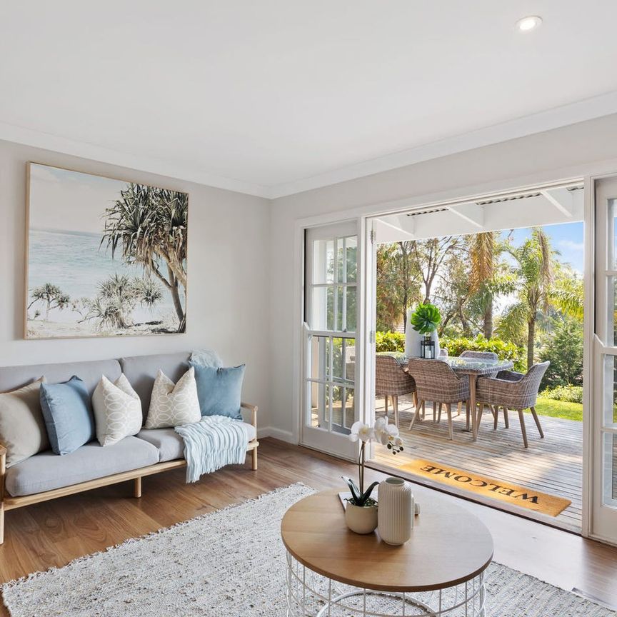 Charming Coastal Duplex Living - Photo 1