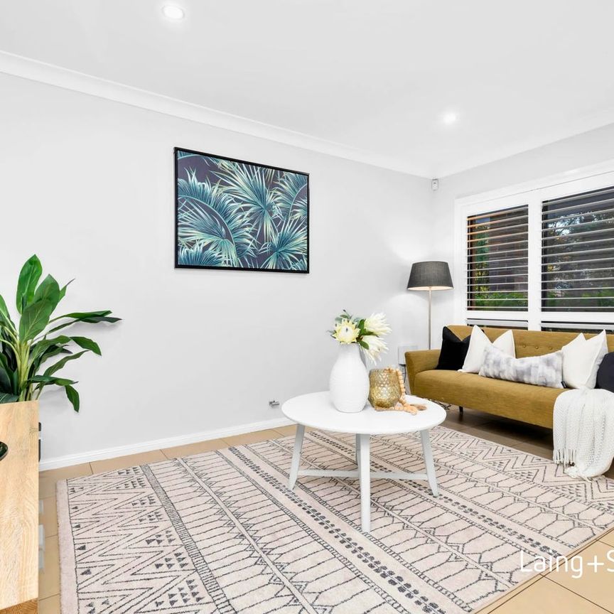 Modern townhouse with multiple living spaces - Photo 1