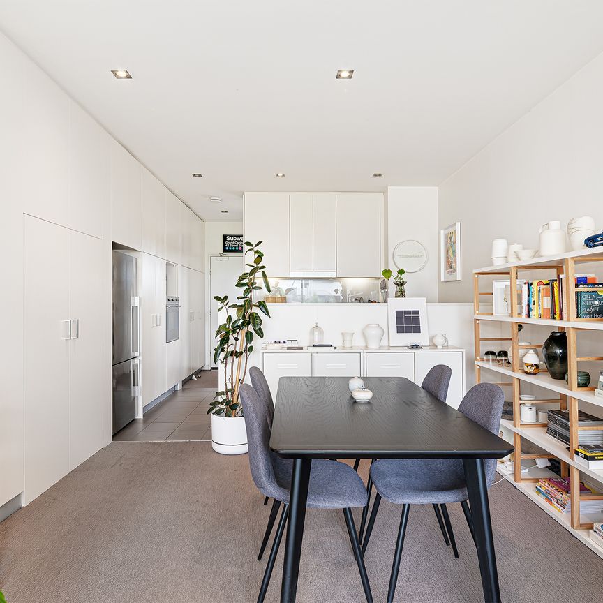 Modern Dual Level, Top-Floor Two Bedroom Apartment with Parking - Photo 1