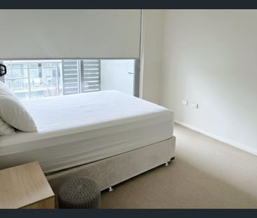 Modern 1 Bedroom + Spacious Study | Prime Waterfront Living in Rhodes - Photo 1