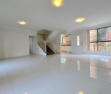 Large 4 Bedroom Townhouse - Photo 1