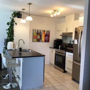 Grand 5 1/2 a louer St-Jérome, a partir du 1 décembre ou 1er janvier. Endroit tranquille avec locataires établies depuis plusieurs année. Parcs a roxi - Photo 2