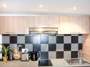 Logement à Paris, Location meublée - Photo 4