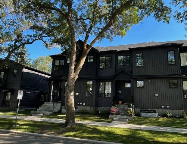 COVETED EXECUTIVE 2-BEDROOM + DEN | PARK-SIDE | STEPS TO UNIVERSITY OF ALBERTA — 2 Bedrooms+ Den Duplex - Photo 1