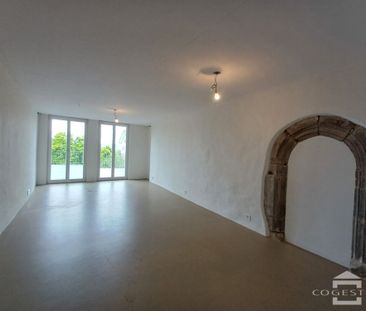 Appartement traversant avec une belle luminosité, centre ville! - Photo 1