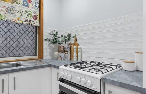 Stylish, Spacious & Set for Easy Living in Golden Grove! - Photo 1