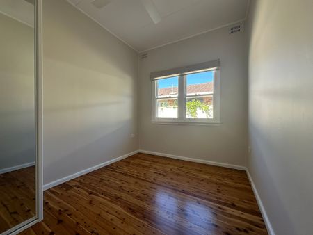 Coastal Charm Meets Modern Comfort - Photo 3