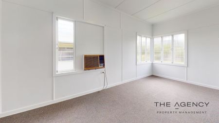 High-set family home in central location - Photo 4