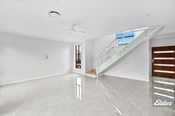 Modern Light-Filled Home with Ground Floor Living and Quality Finishes - Photo 1