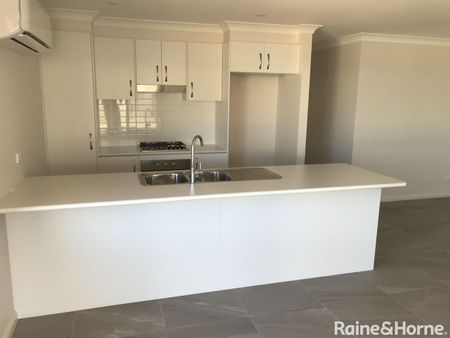 NEAR NEW 4 BEDROOM HOME - Photo 2