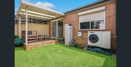 Immaculate and Convenient Two Bedroom Villa - Photo 2