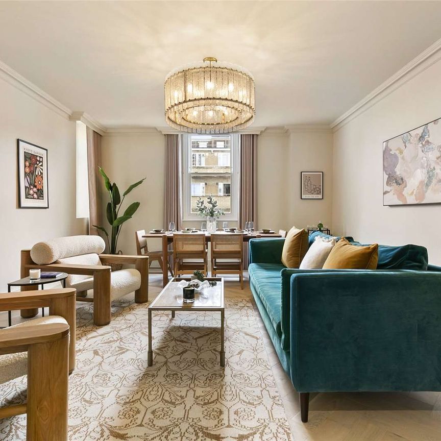 A beautifully refurbished three-bedroom apartment with direct lift access, arranged over the top floors of an elegant Victorian conversion. - Photo 1