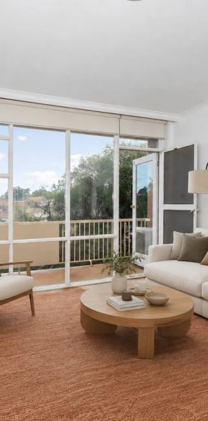 Light-Filled Top-Floor Living Moments from Elwood Village! - Photo 1